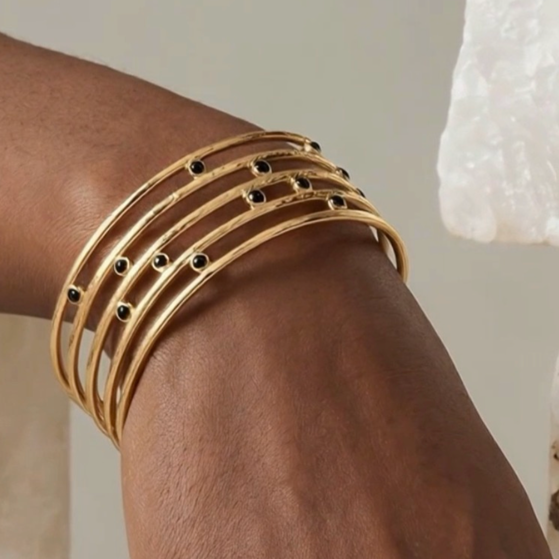 Tiffany Gold Bangle Bracelet with Black Stones