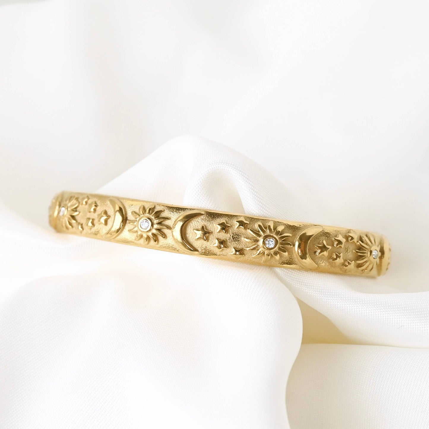 Odessa Sun, Moon, Stars Cuff Bracelet - Embossed Celestial Bracelet: Cuff Bracelet / One Size