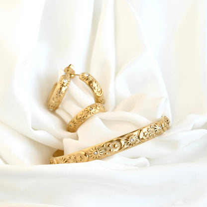 Odessa Sun, Moon, Stars Cuff Bracelet - Embossed Celestial Bracelet: Cuff Bracelet / One Size