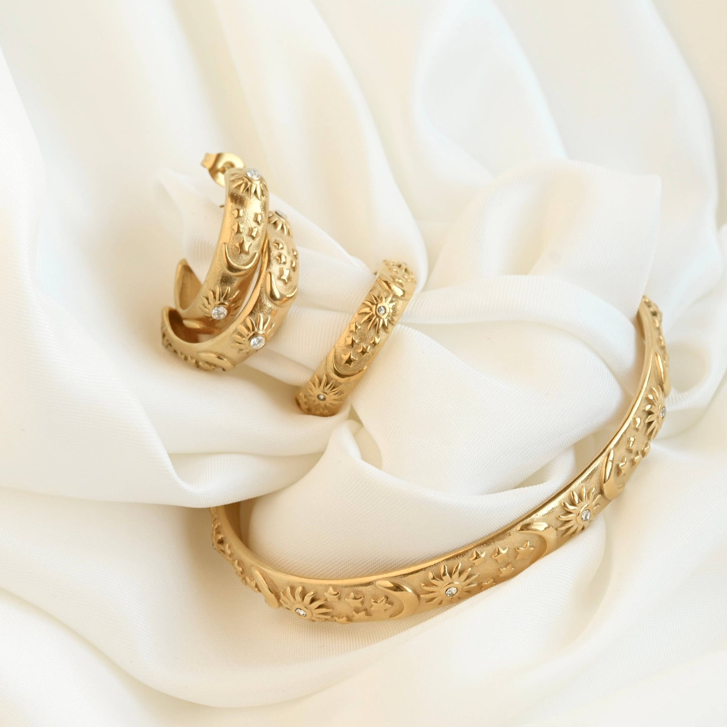 Odessa Sun, Moon, Stars Cuff Bracelet - Embossed Celestial Bracelet: Cuff Bracelet / One Size