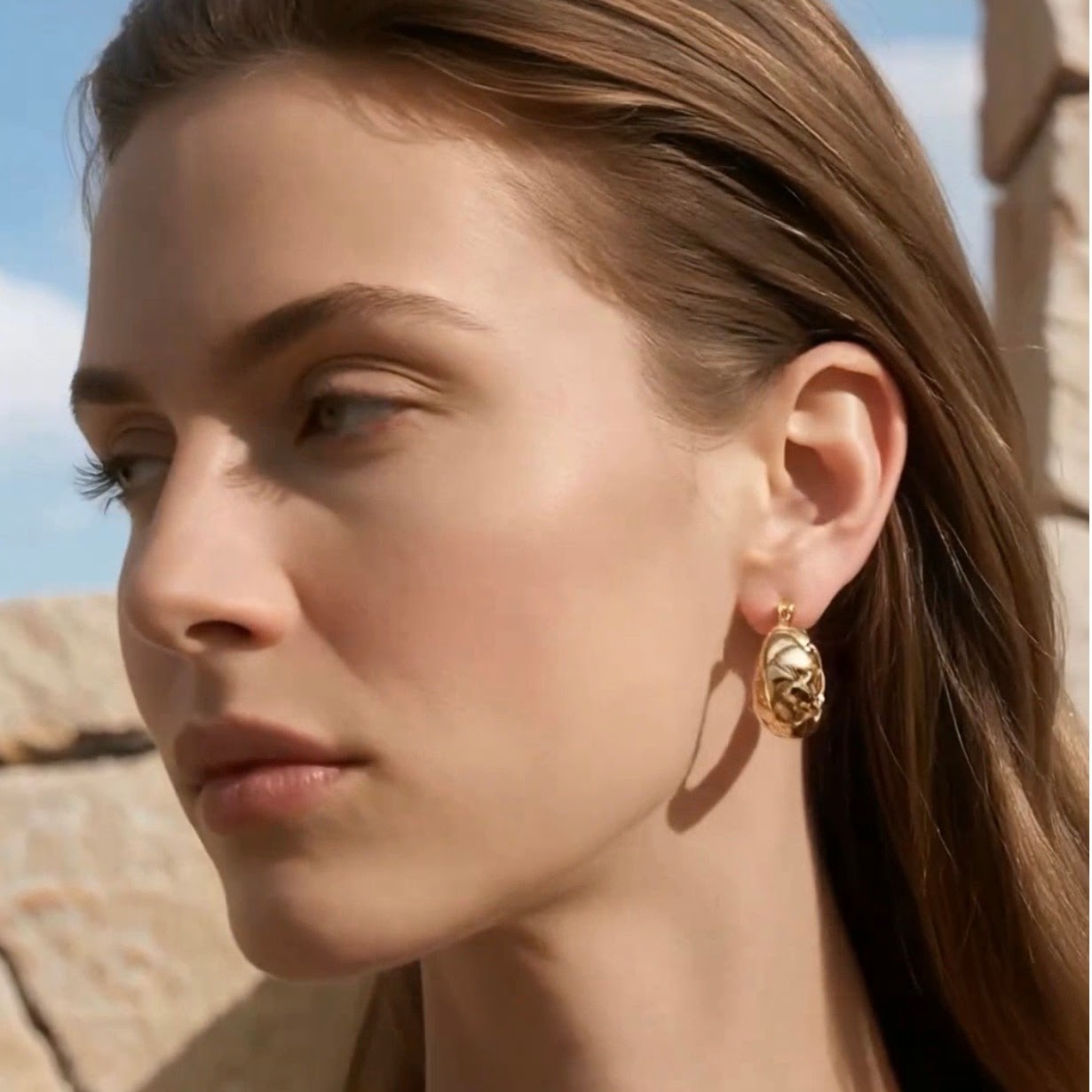 Woven hoop earrings.