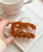 Iris Pretzel-Shaped Resin Hair Claw Clip – Caramel Tortoise