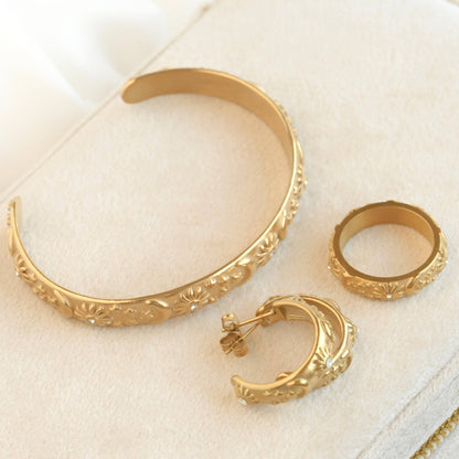 Odessa Sun, Moon, Stars Cuff Bracelet - Embossed Celestial Bracelet: Cuff Bracelet / One Size